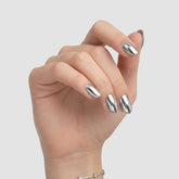 Petal shape chrome NIBL click-on nails on a hand
